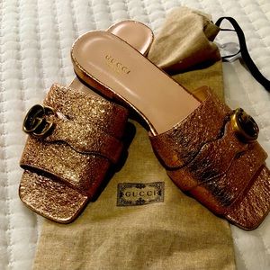 Gucci Slides.